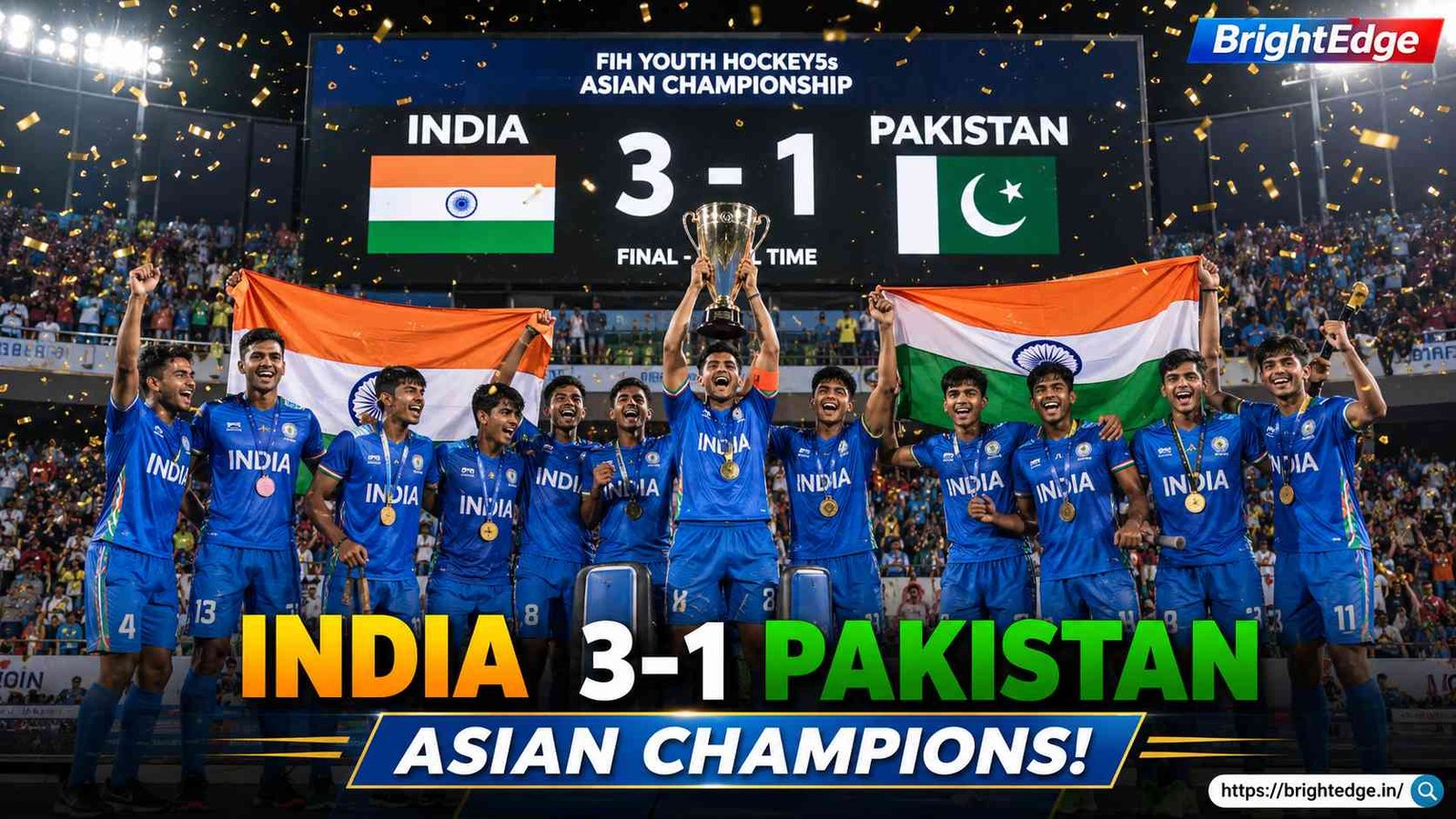 Indian sub-junior men's hockey team celebrates after defeating Pakistan 3–1 to win the FIH Youth Hockey5s Asian Championship 2026, lifting the trophy with the Indian flag and gold medals.